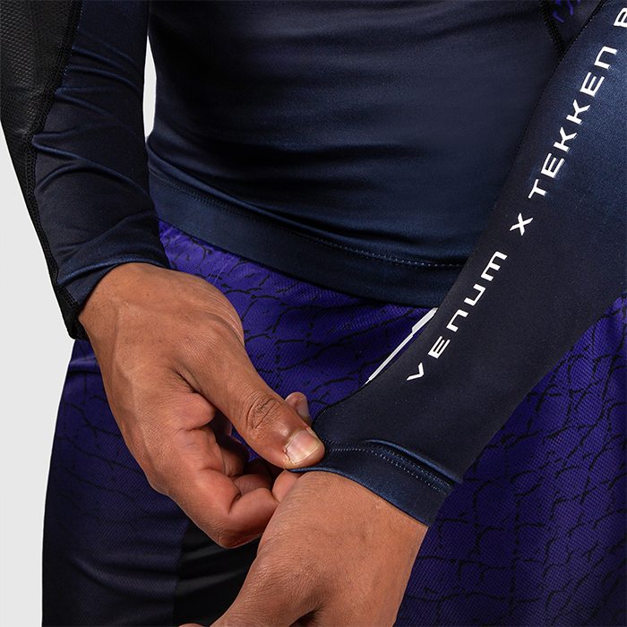Venum x TEKKEN 8 L&aring;ng&auml;rmad Rashguard Kazuya Svart Lila