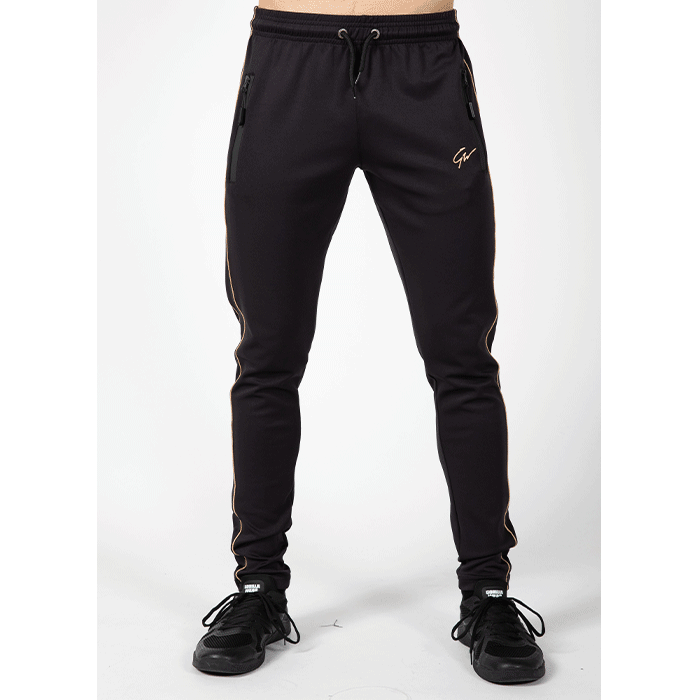 Läs mer om Wenden Track Pants, Black/Gold